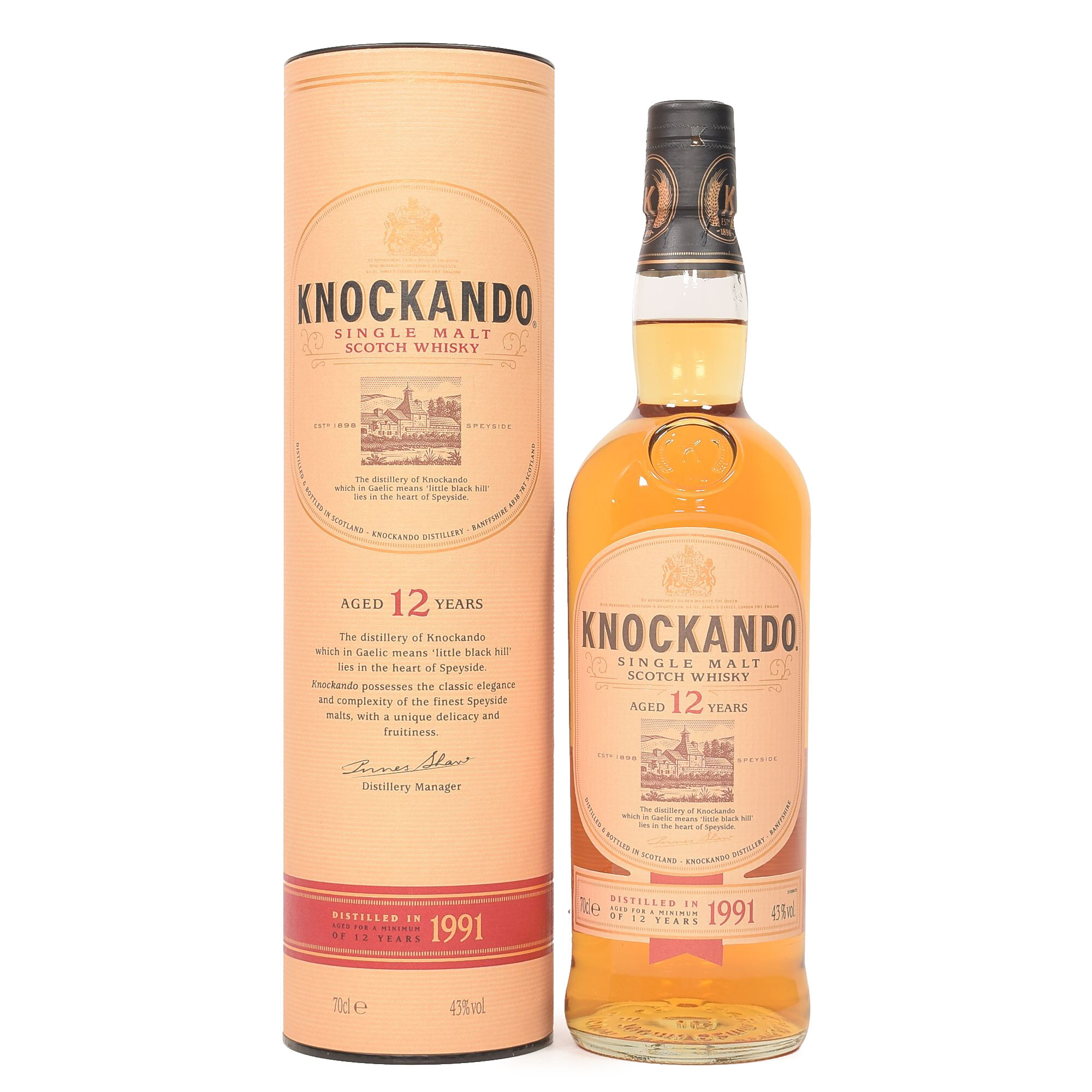 knockando 1997 bottle beside tin