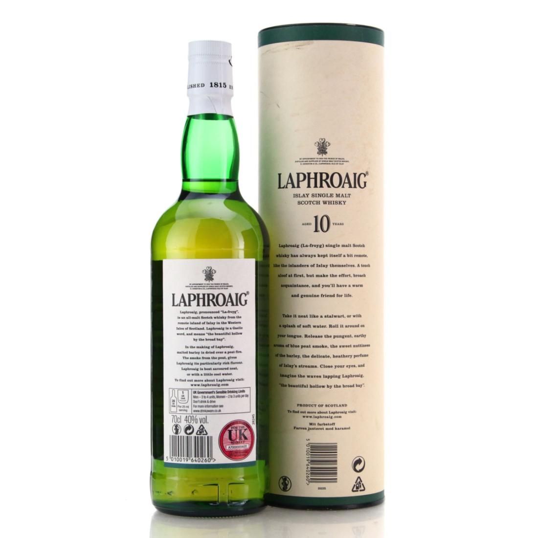 laphroaig 10 year old bottle beside tin rear