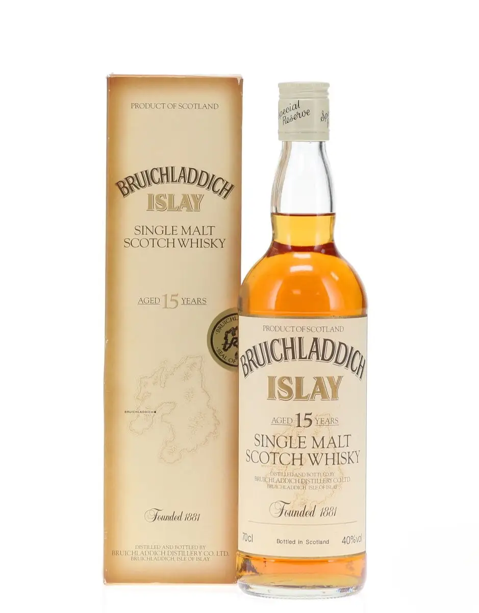 bruichladdich 15 year old clear bottle standing beside a cream box, front image