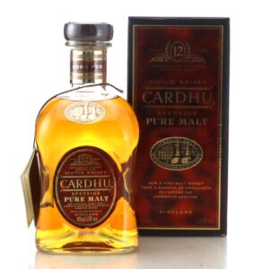 cardhu 12 year old pure bottle standing beside red box