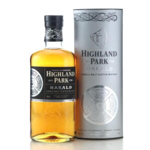 highland park harald bottle standing beside silver box