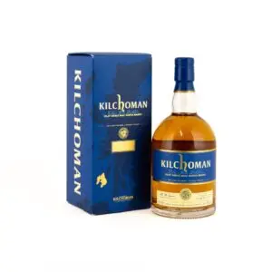 kilchoman 2010 spring release bottle with blue ftont label standing next to a blue box