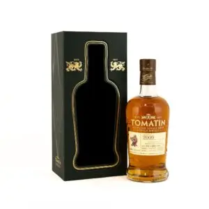 tomatin 2009 12 year old single cask bottle with cream label standing beside a green wooden presentation box