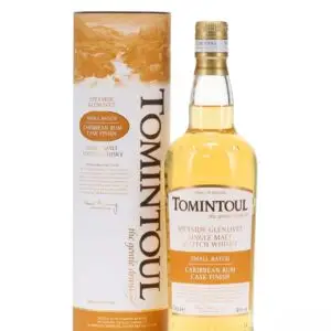 tomintoul caribbean rum cask finish clear bottle standing beside yellow and white tin front image